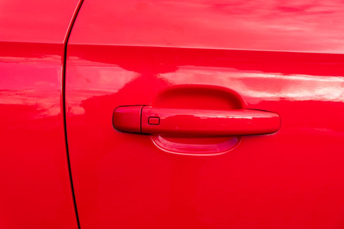 Detailer polishing a vehicle at Ryland Neeleys detailing in Texarkana, Texas